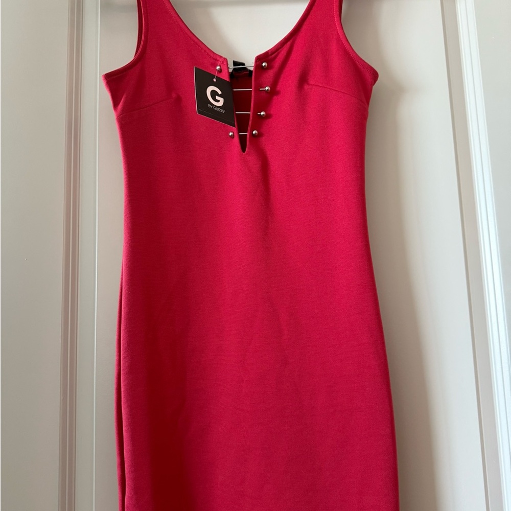 New with tags! Edgy red mini dress with silver details
Size XS